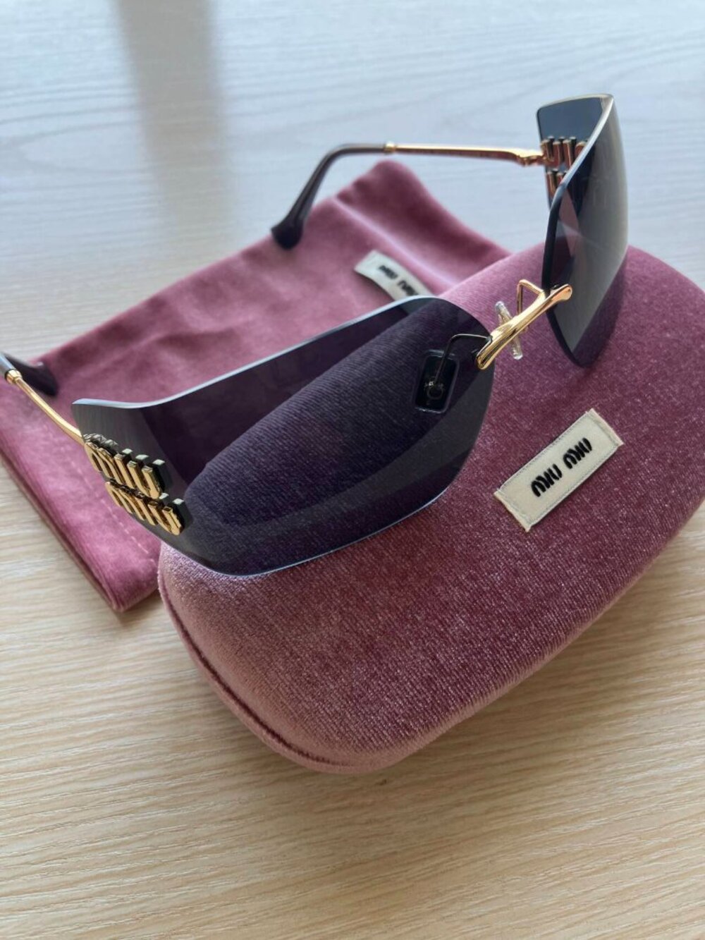 Miu Miu MU54YS Gold Logo Rimless Sunglasses